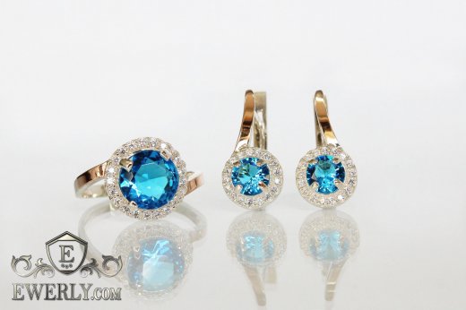 Жіночі кільце і сережки з золотом зі срібла, купити з блакитним камінням