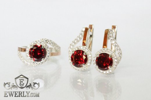 Женские  кольцо и серёжки с золотом из серебра, купить с красными камнями